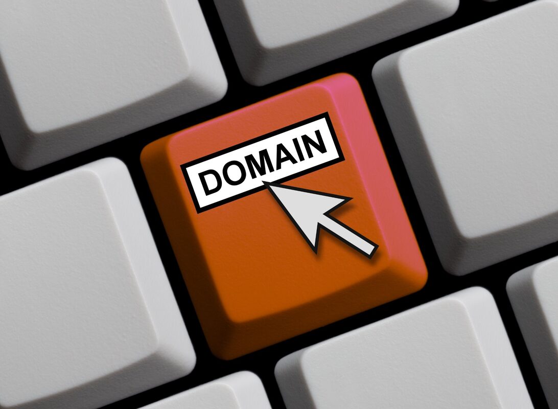 Domain kaufen – Tastatur mit Domain-Taste